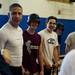 Skyline players joke around with head coach Frank Garcia on Wednesday, April 24. Daniel Brenner I AnnArbor.com
